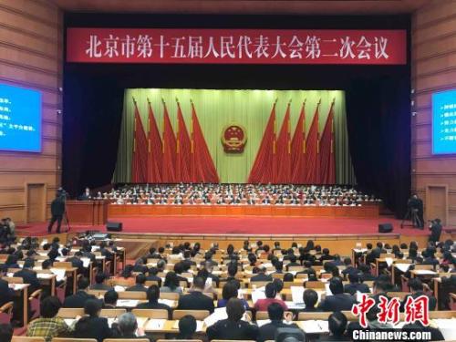 北京市十五屆人大二次會議14日開幕。北京市長陳吉寧向大會作政府工作報告?！∫?攝