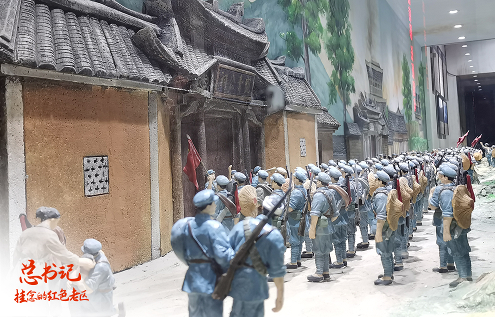 這是在福建省長(zhǎng)汀縣中復(fù)村拍攝的紅軍長(zhǎng)征出發(fā)動(dòng)員會(huì)微型雕塑（2021年4月27日攝）。
